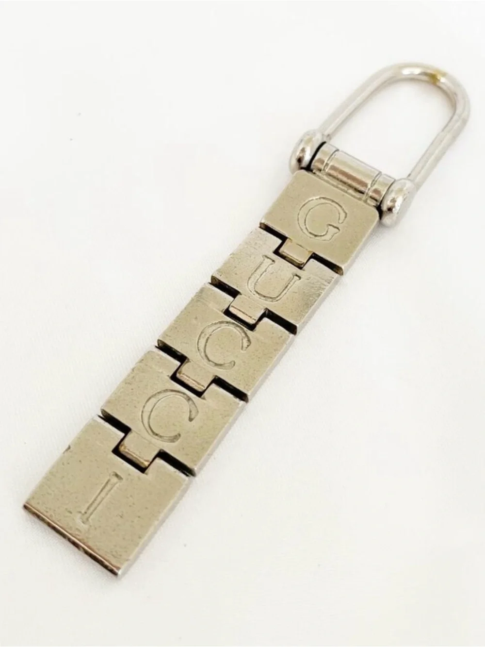 Vintage 1990s Gucci Articulated GUCCI Logo Keychain Silver Tone Made in Italy Ra
